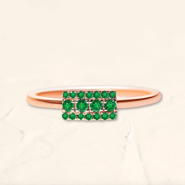 Sapna ring in rose gold set with emeralds