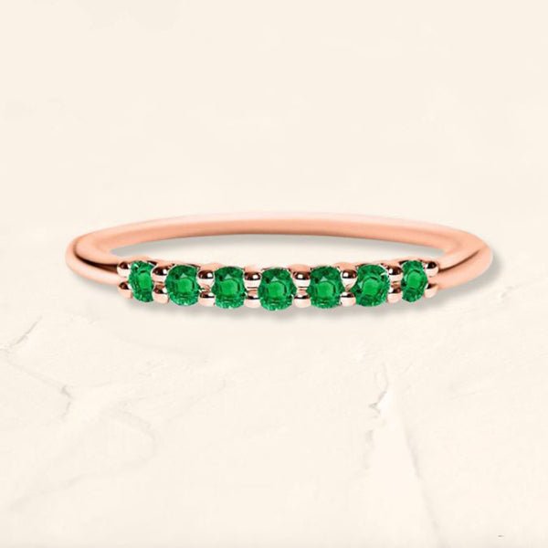 Anillo Vadha de oro rosa engastado con 7 esmeraldas