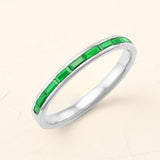 Men's baguette-cut emerald ring in 18-carat white gold