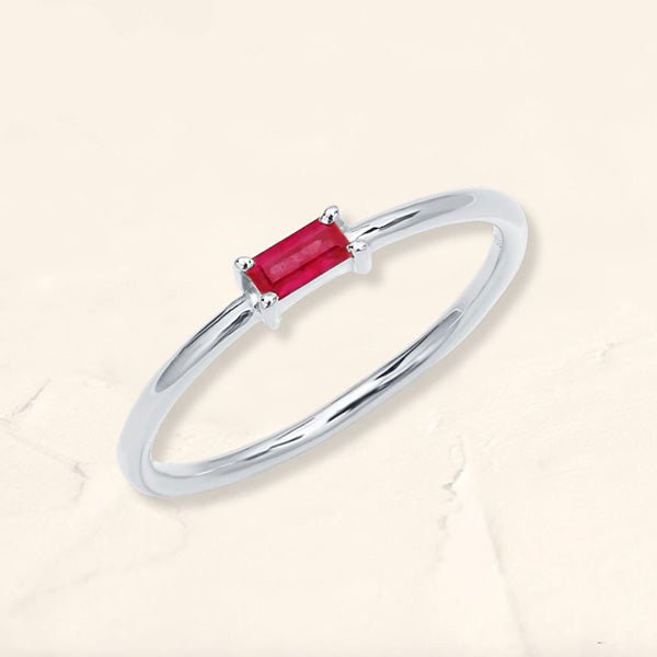 white gold baguette ruby solitaire ring