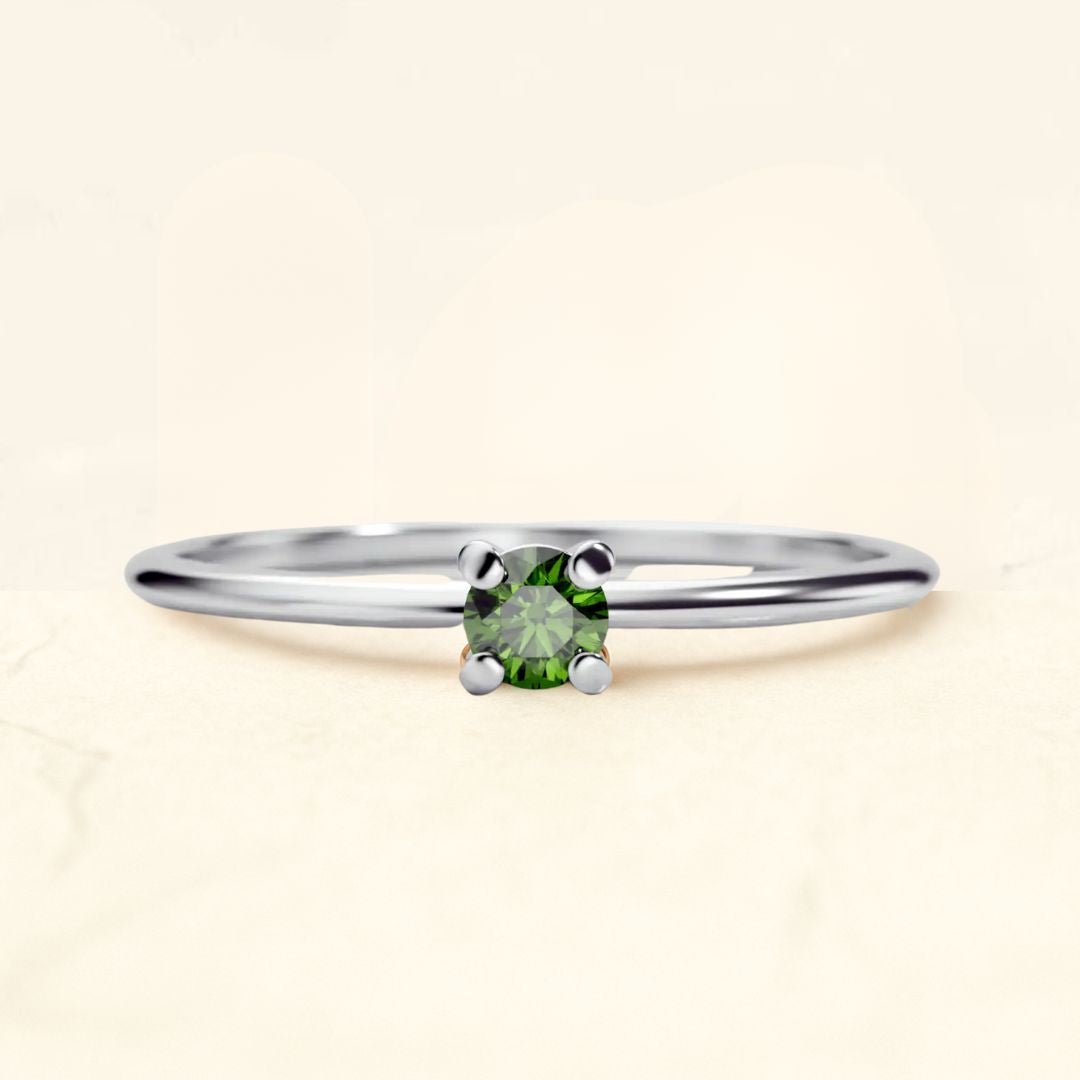 Saral white gold green diamond ring