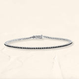 Bracelet tennis Ganga rivière en diamant noir et or blanc 18cts