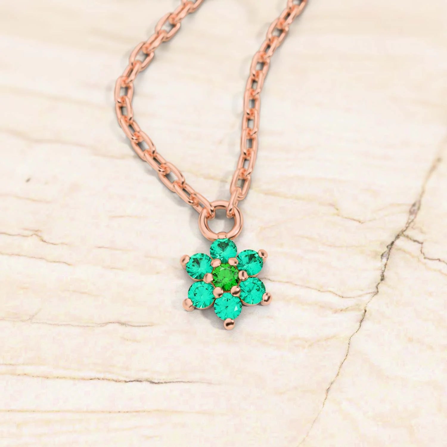 collier surya or rose emeraude