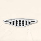 Bague Brami XL en or blanc sertie de 15 diamants noirs