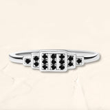 Bague Brami XL en or blanc sertie de 15 diamants noirs