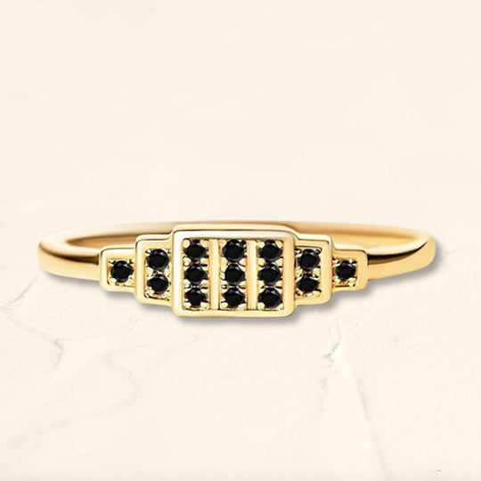 Anillo Brami XL de oro amarillo engastado con 15 diamantes negros