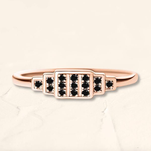 Anillo Brami XL de oro rosa engastado con 15 diamantes negros