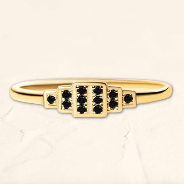 Brami geometric ring in yellow gold set with black diamonds