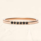 wedding ring in rose gold and black diamonds