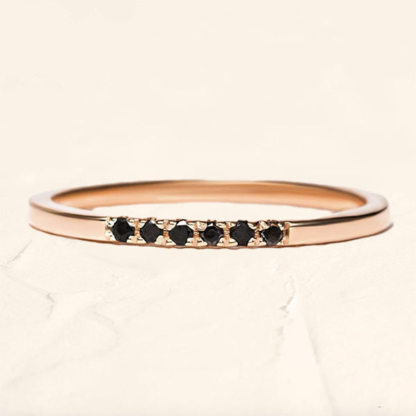 wedding ring in rose gold and black diamonds