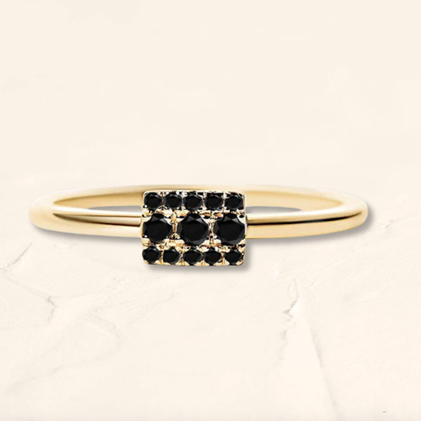 Yellow gold Sapna ring set with 13 black diamonds