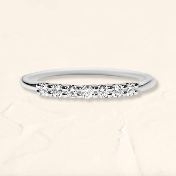 Wedding ring vadha paved with 7 diamonds of 2mm white gold