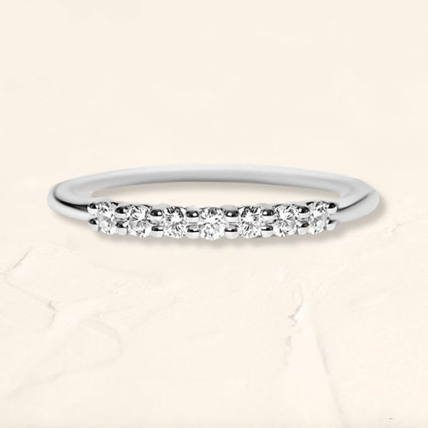 Wedding ring vadha paved with 7 diamonds of 2mm white gold