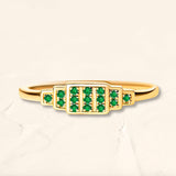 Yellow gold Brami ring set with emeralds