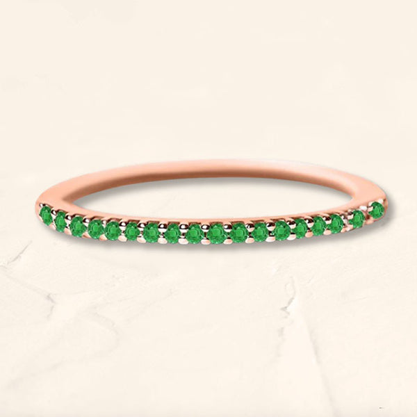 Shadi eternity ring in emerald and rose gold