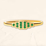 Yellow gold Brami ring set with emeralds