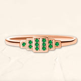 Brami ring in rose gold set with emeralds