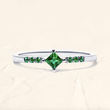 Silver Kali ring, princess cut emerald and emerald pavement