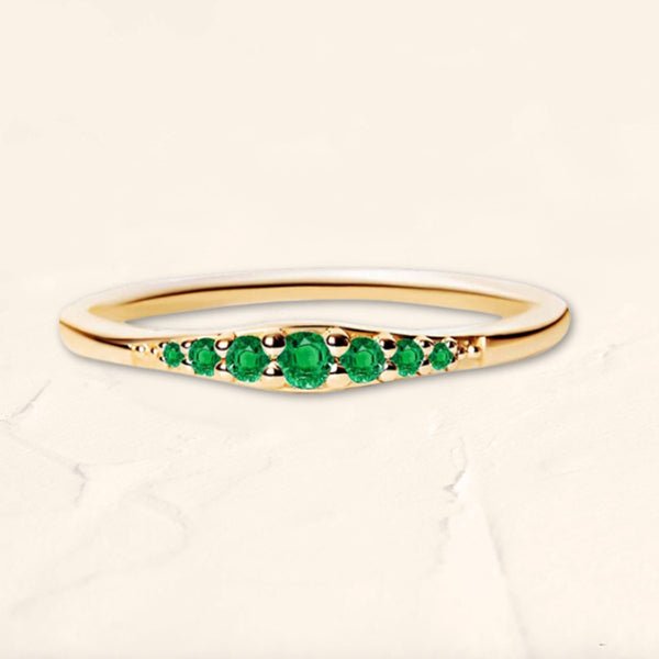 Yellow gold emerald sushma ring