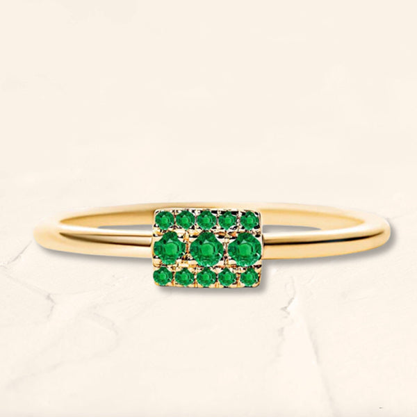 Geometric emerald ring