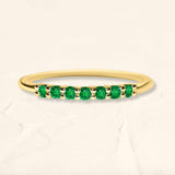 Yellow gold vadha ring set with 7 emeralds