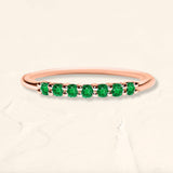 Ring vadha in rose gold set with 7 emeralds