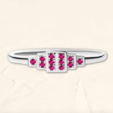 Rectangular geometric ring in ruby and white gold