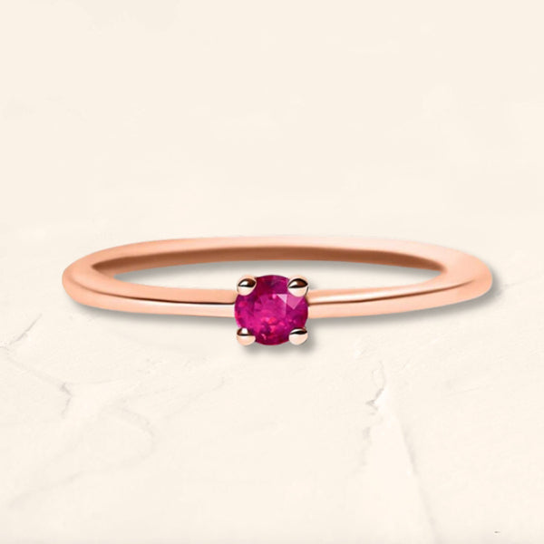 Bague solitaire rubis en or rose sertie d‘un rubis