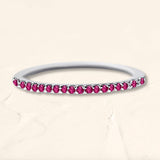 Eternity wedding band in ruby and white gold