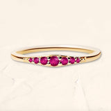 Yellow gold ring with ruby gradations