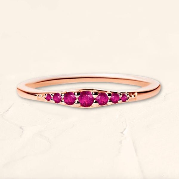 Ring gradient of rubies in rose gold