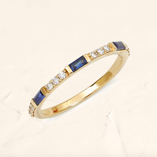 Yellow gold semi eternity sapphire and round diamond ring