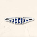 Geometric ring brami XL in white gold set with natural sapphires