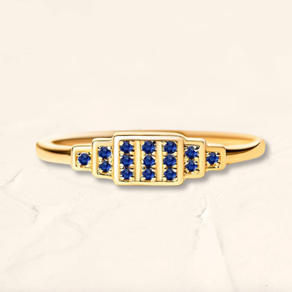 Geometric ring brami XL in yellow gold set with natural sapphires