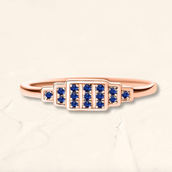 Geometric ring brami XL in rose gold set with natural sapphires