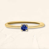 Yellow gold Saral ring set with a sapphire