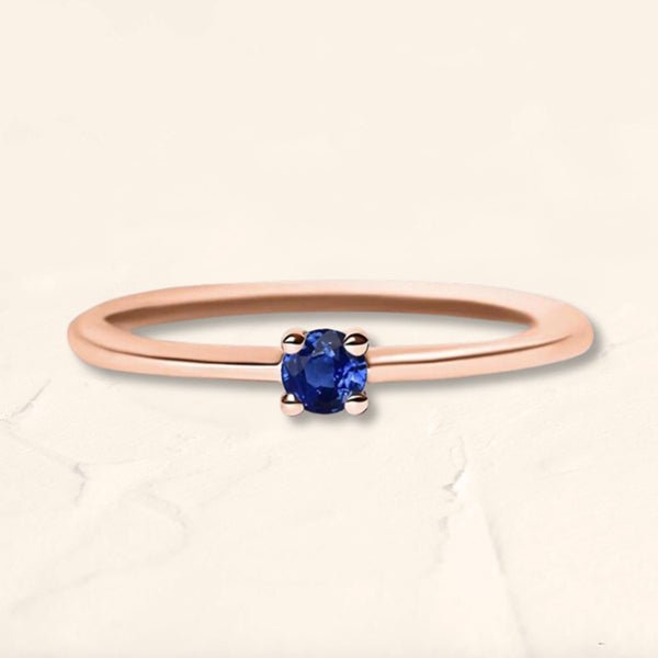 Saral ring in rose gold set with a sapphire