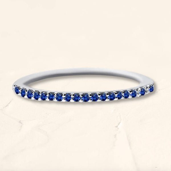 White gold paved sapphire eternity ring