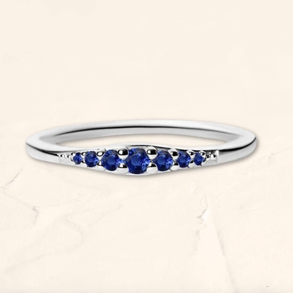 Graduated sapphire ring