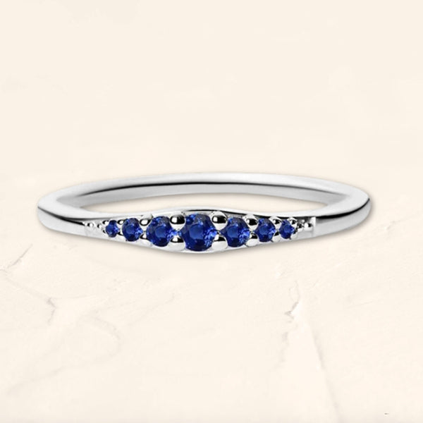 Graduated sapphire ring