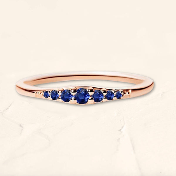 Sushma ring in rose gold set with sapphires