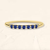 Yellow gold vadha ring set with 7 sapphires