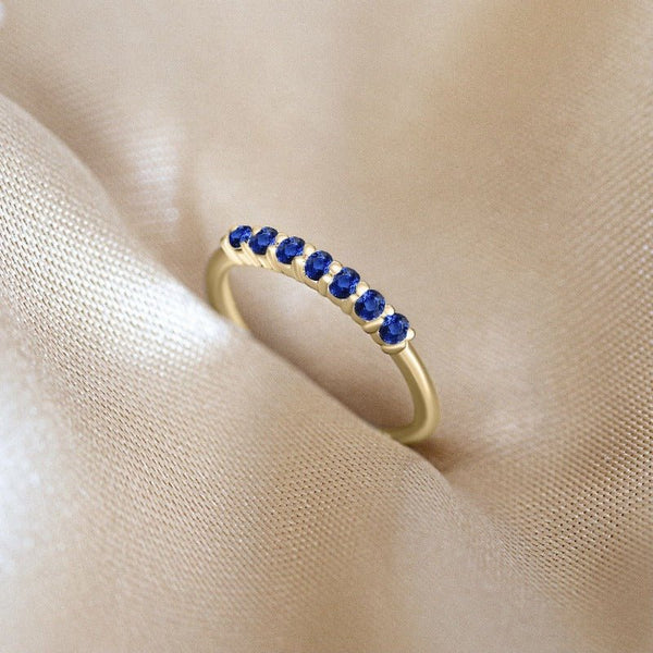 Yellow gold vadha ring set with 7 sapphires