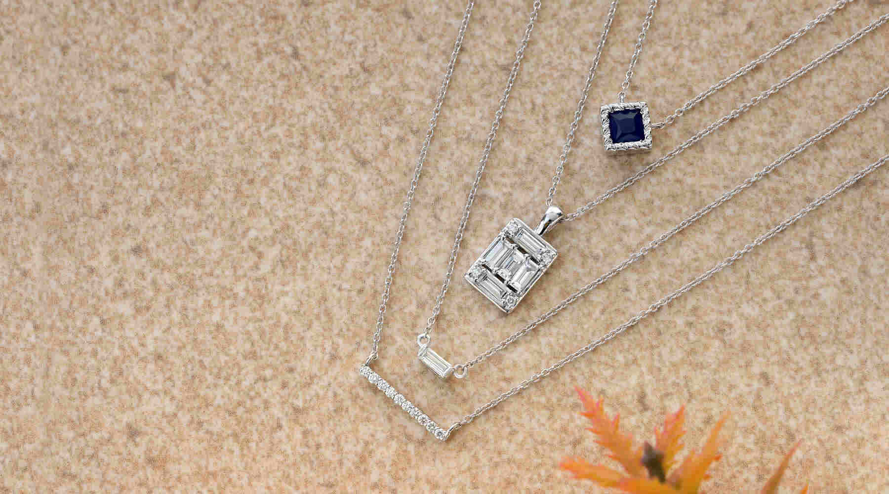White gold diamond and sapphire necklaces