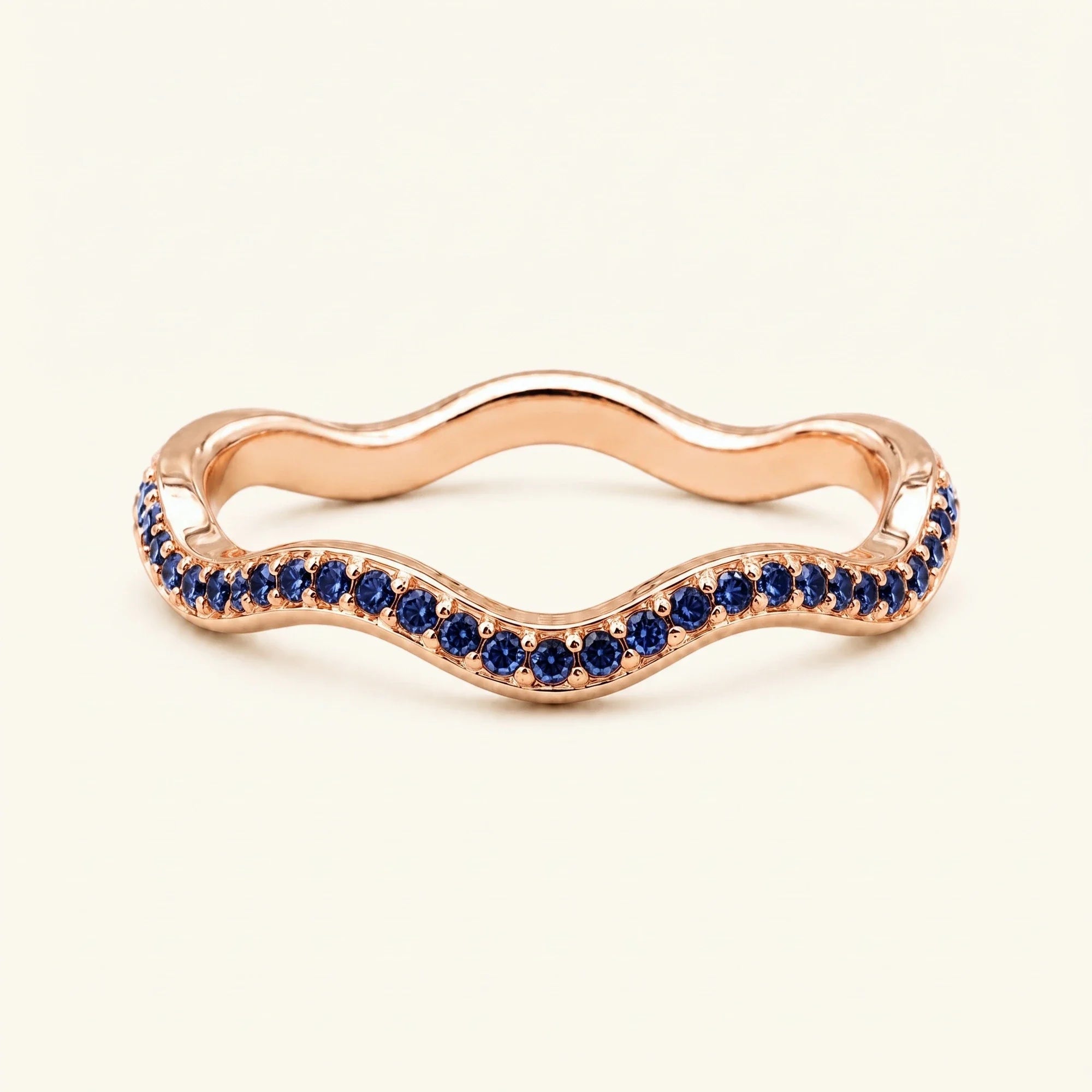 Alliance vague saphirs Thalassa en or rose 18 carats, demi-éternité sertie grain