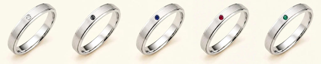 Bague homme Dhruva en or blanc 18 carats déclinée en diamant, diamant noir, saphir, rubis et émeraude