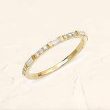 Yellow gold semi eternity baguette and round diamond ring