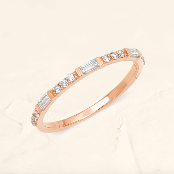 Bague semi eternitée baguette et diamant rond en or rose 18cts