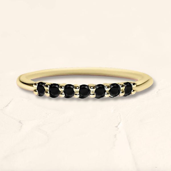 Bague vadha en or jaune sertie de 7 diamants noirs naturels