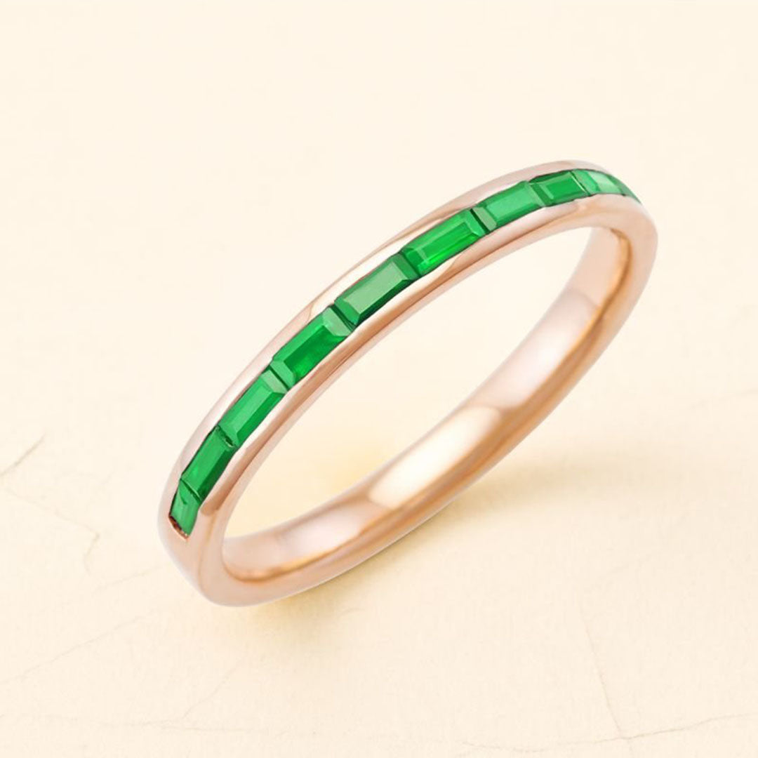 18-carat rose gold emerald rose gold ring 
baguette cut for men